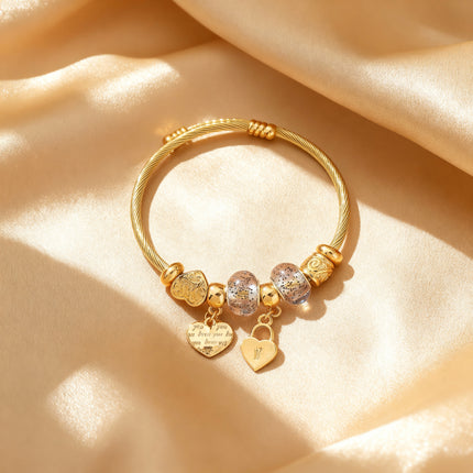 Elegant Gold Charm Bangle Bracelet
